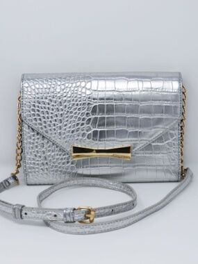 Betsey Johnson metallic silver crocodile embossed crossbody bag with a gold chai